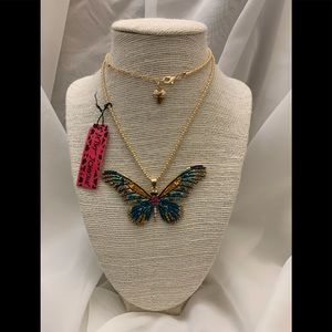 Betsey Johnson necklaces with butterfly charm.